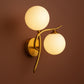 Brass Wall Light | Double Globe Modern Curved Design with Frosted Glass Spheres
