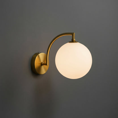 Modern Brass Wall Light | Curved Arm Sconce with Clear Glass Globe