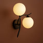 Brass Wall Light | Double Globe Modern Curved Design with Frosted Glass Spheres