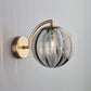 Art Deco Wall Light | Fluted Glass Globe Sconce with Curved Brass Arm