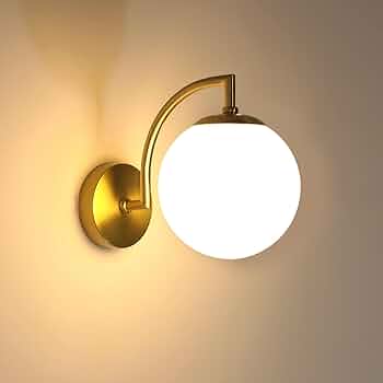 Modern Brass Wall Light | Curved Arm Sconce with Clear Glass Globe