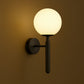 Modern Wall Light | Brass Wall Sconce with Frosted Globe Shade