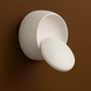 Contemporary Wall Light | Adjustable Round LED Sconce in Black or White