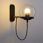 Antique Brass Wall Light | Globe Glass Shade Sconce with Exposed Wire and Metal Backplate
