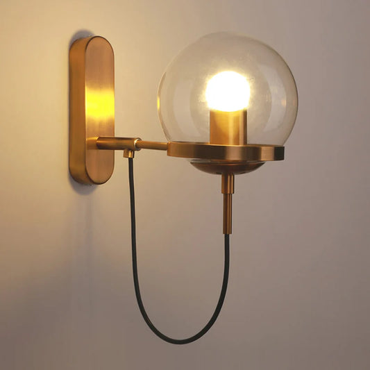 Antique Brass Wall Light | Globe Glass Shade Sconce with Exposed Wire and Metal Backplate
