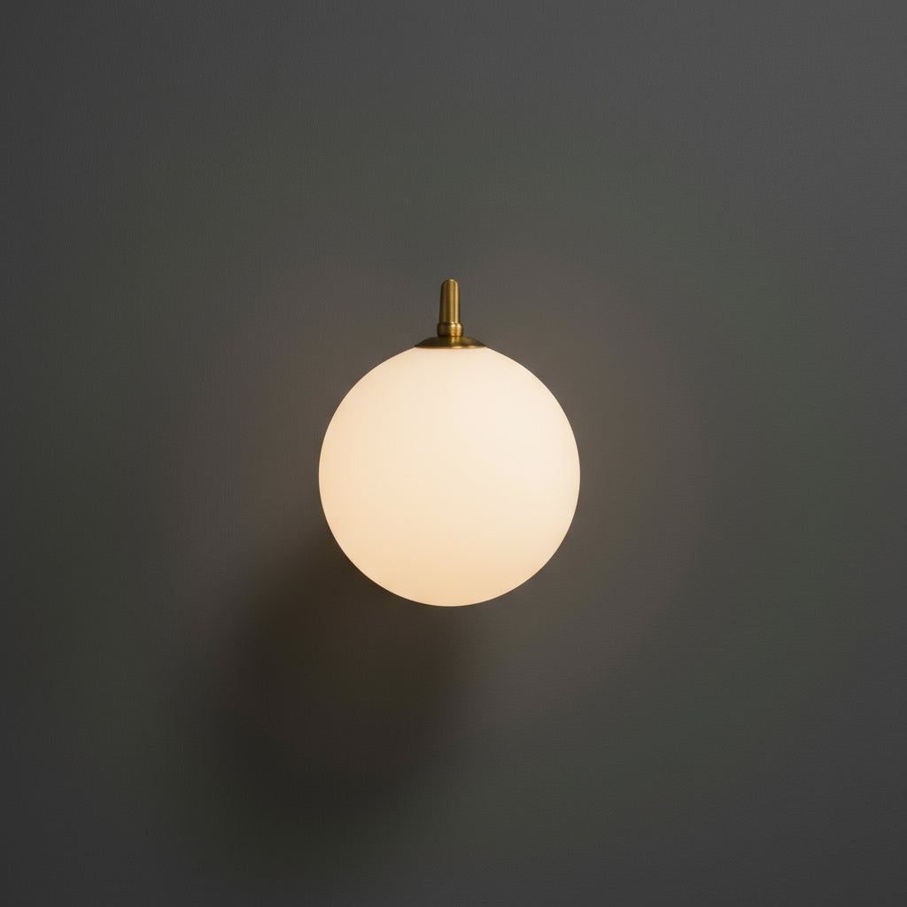 Modern Brass Wall Light | Curved Arm Sconce with Clear Glass Globe