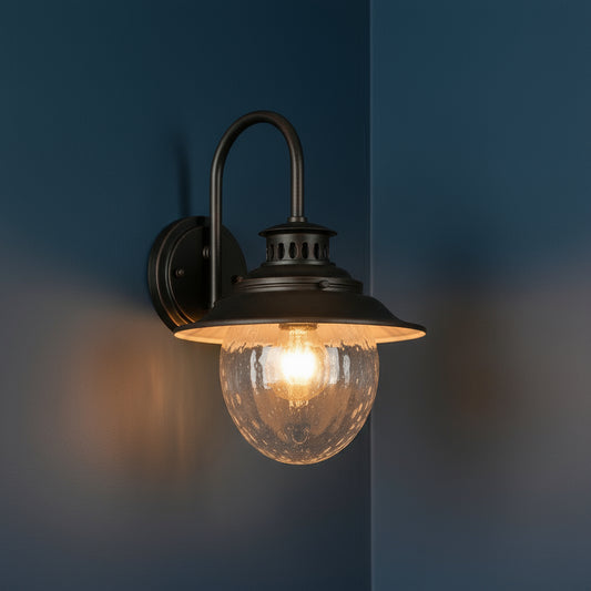 Antique Brass Outdoor Wall Light | Industrial Lantern-Style Sconce with Curved Arm and Hammered Glass Shade
